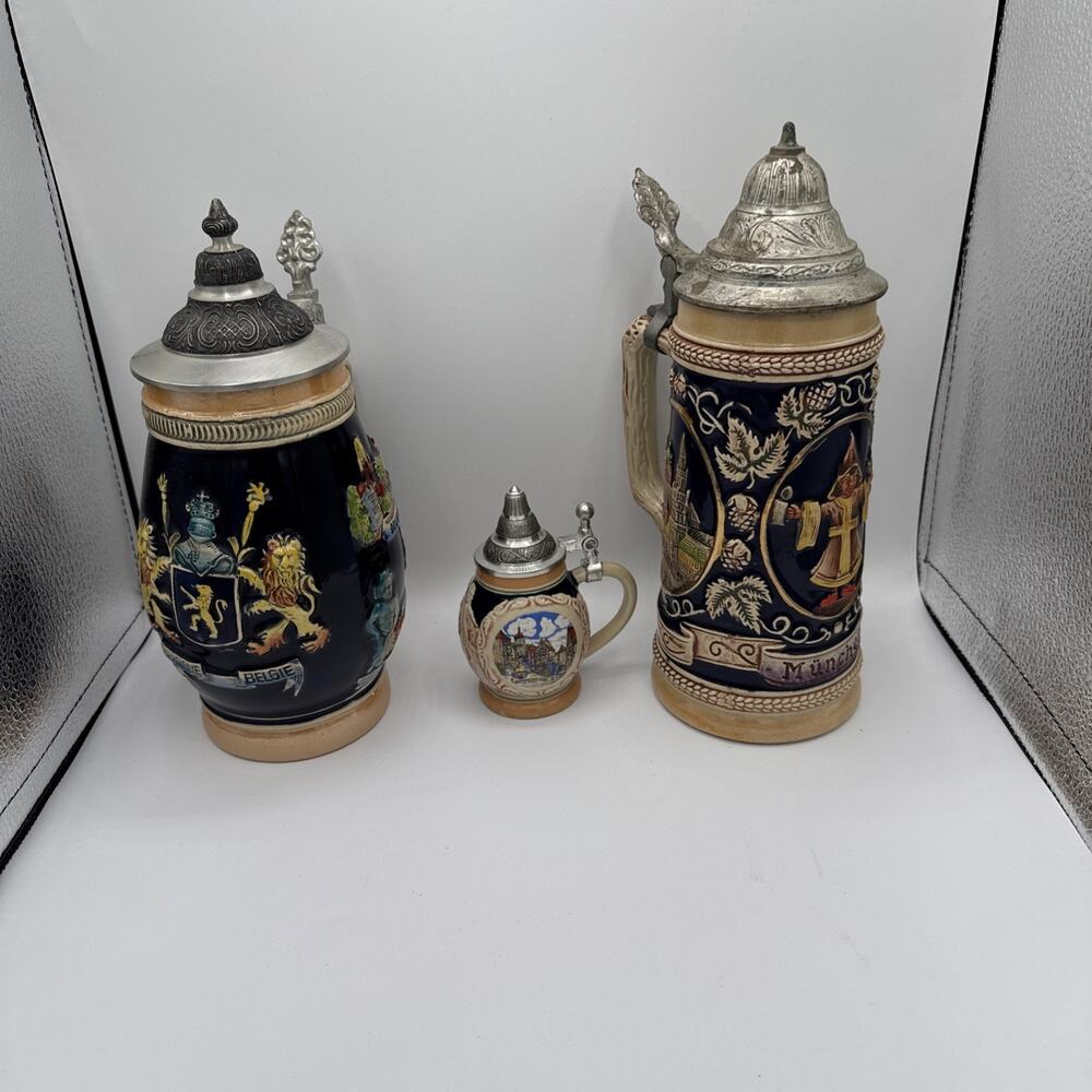 Vintage Set of 3 German Cobalt Blue Relief Beer Steins